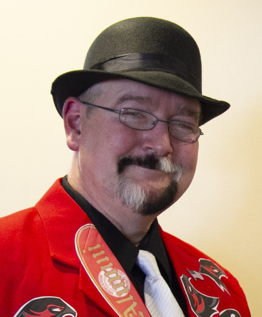 Headshot of smiling man